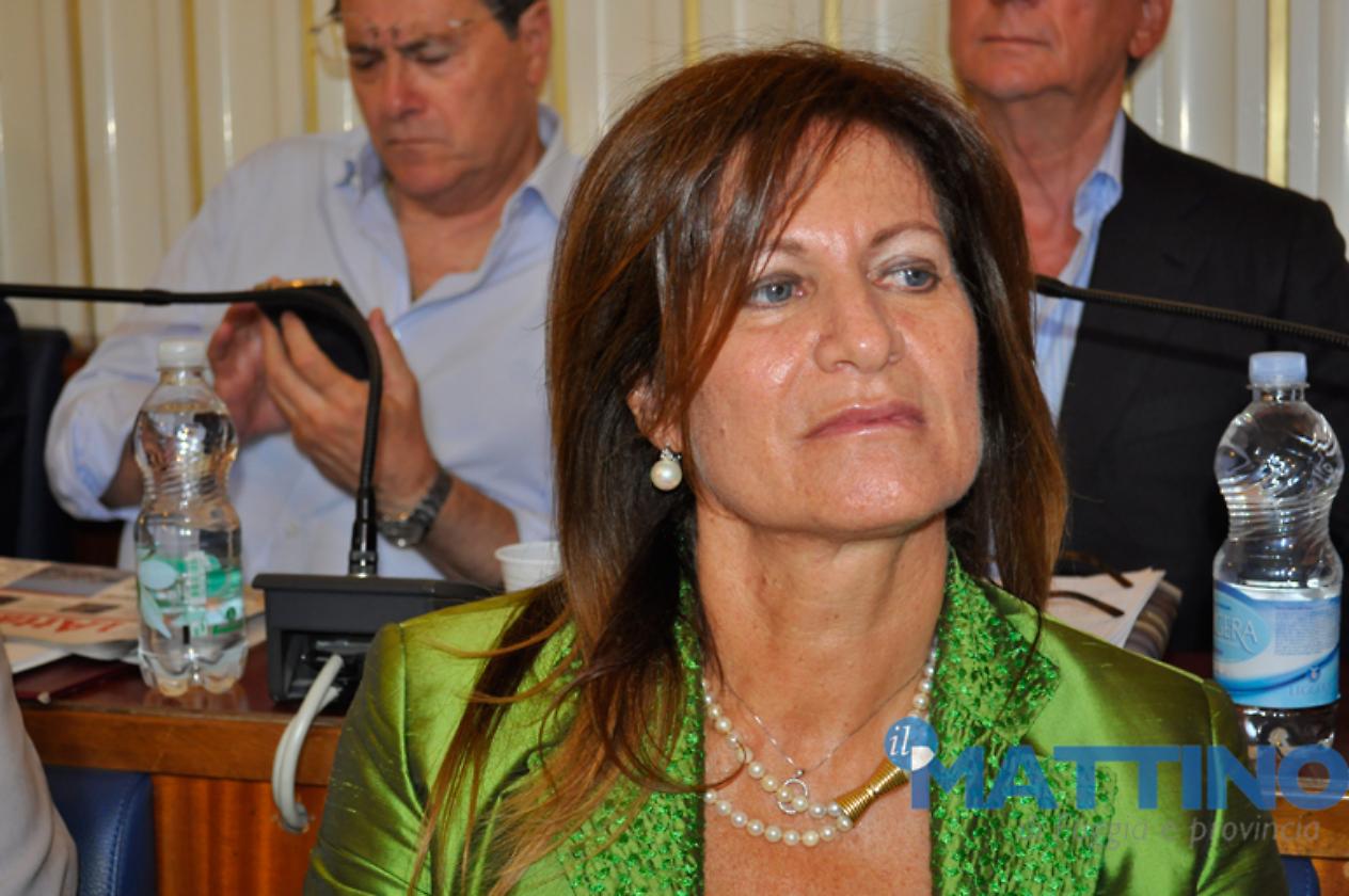 La preside