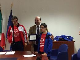 Il consigliere Pace premia il campione diversamente abile Marco Faruoli